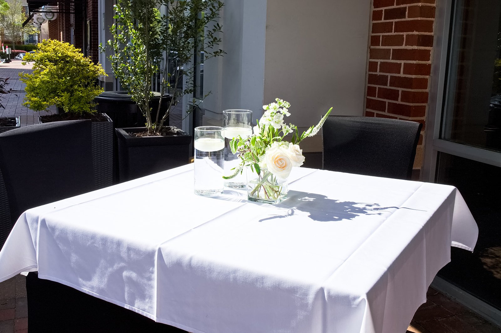 Patio table with rose C&W Steakhouse Ballantyne